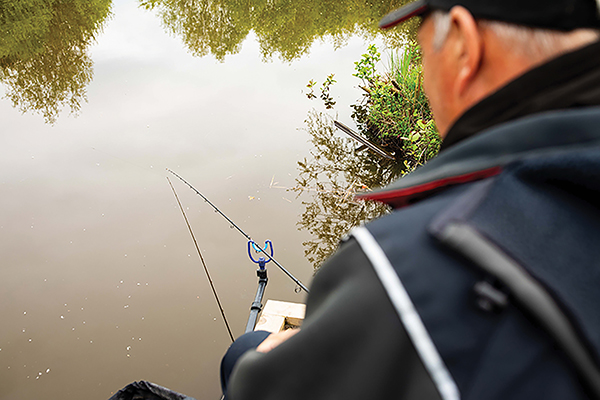 Putting Piece of Fish on Fishing Rod